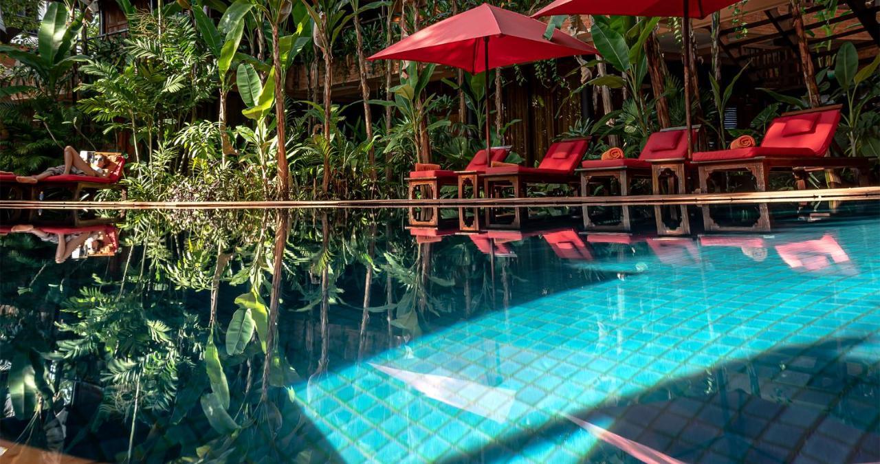 Angkor Village Hotel Siem Reap Eksteriør billede The swimming pool at the resort